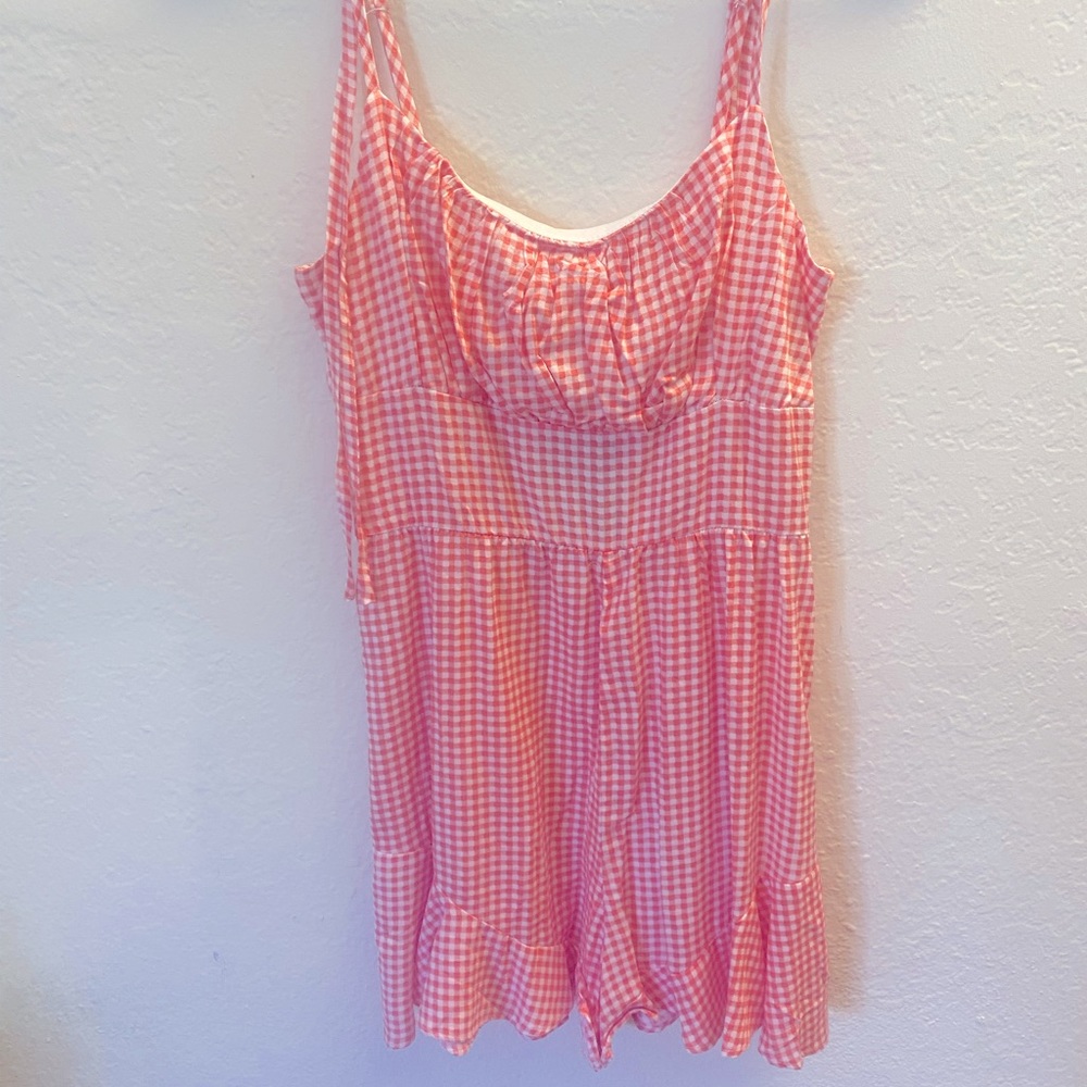 Romper lily rose XS never worn